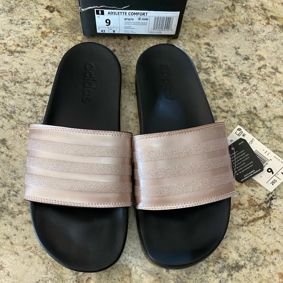 adidas Shoes - NWT Pink and Black women’s Adidas Slides. Size 9